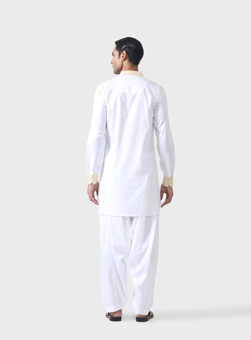 ELEGANT EXCELLENCE THE BESPOKE WHITE PATHANI SUIT